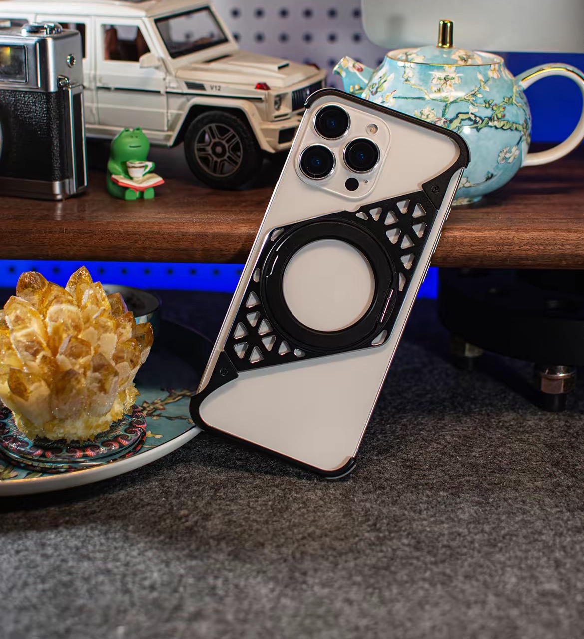 Innovative metal heat dissipation frameless rotating magnetic bracket mobile phone case