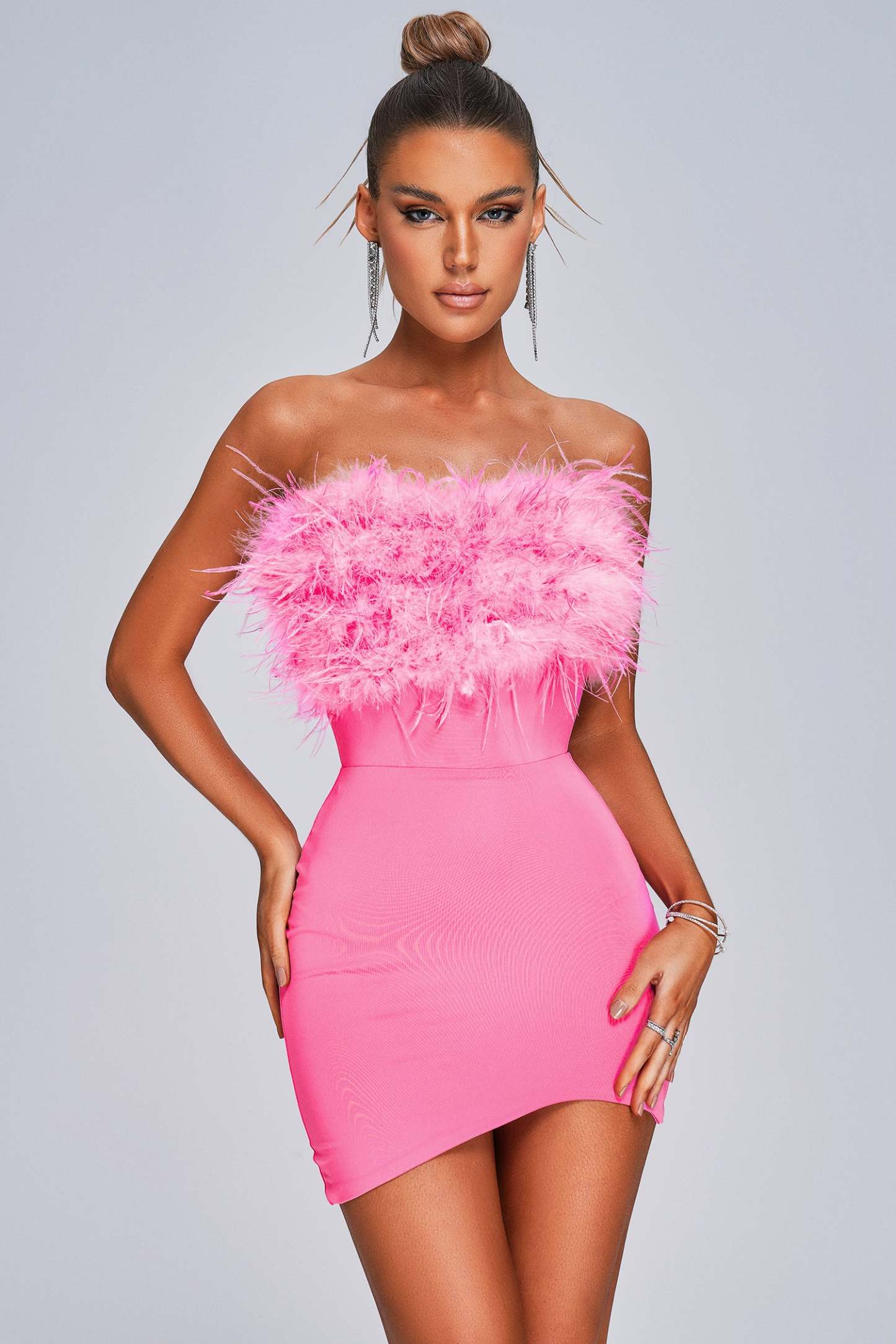 ANYTHING AND EVERYTHING STRAPLESS FEATHER MINI DRESS IN FUCHSIA