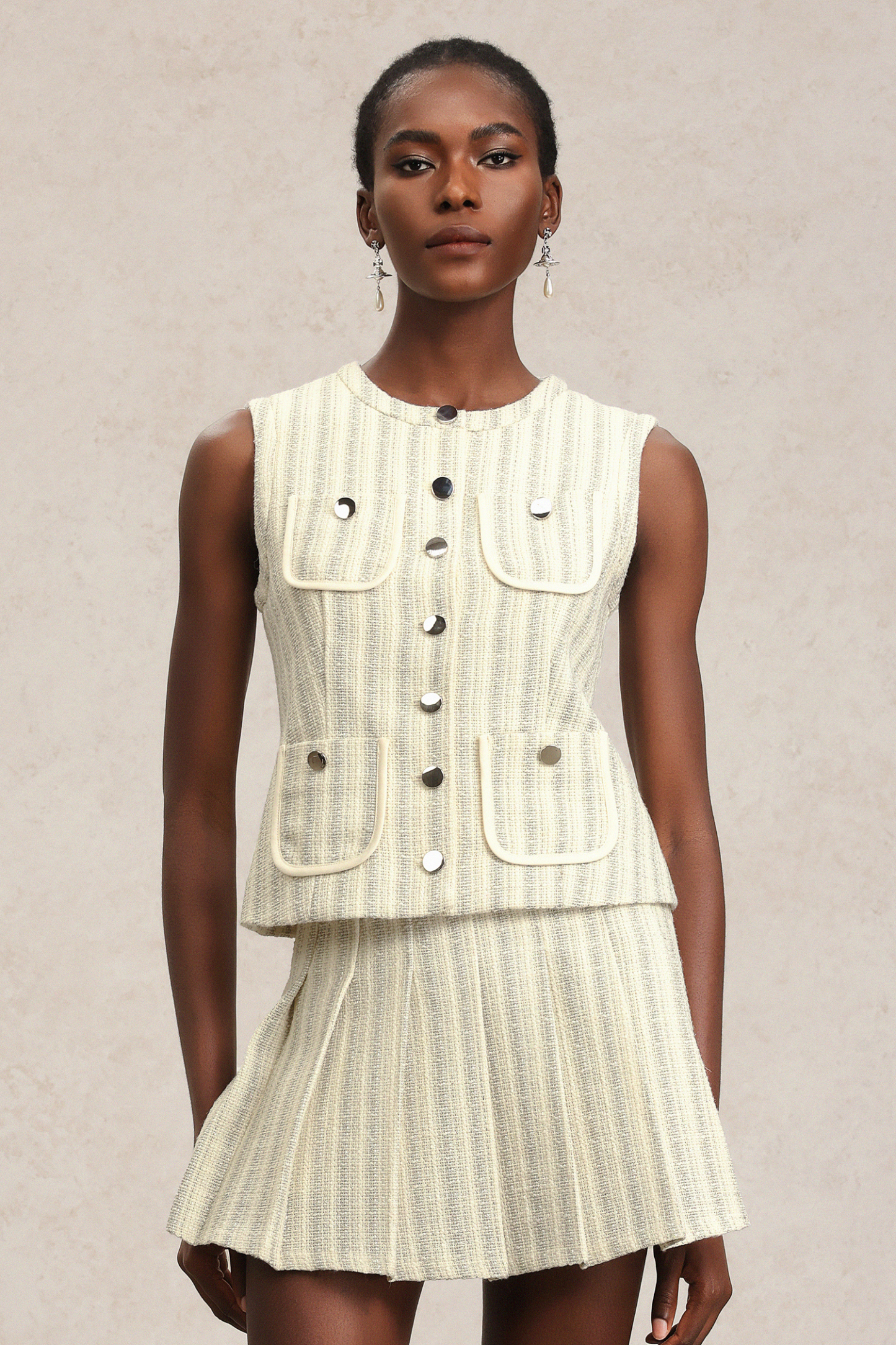 Vikare Sleeveless Round Neck Top And Skirt Two-Piece Set