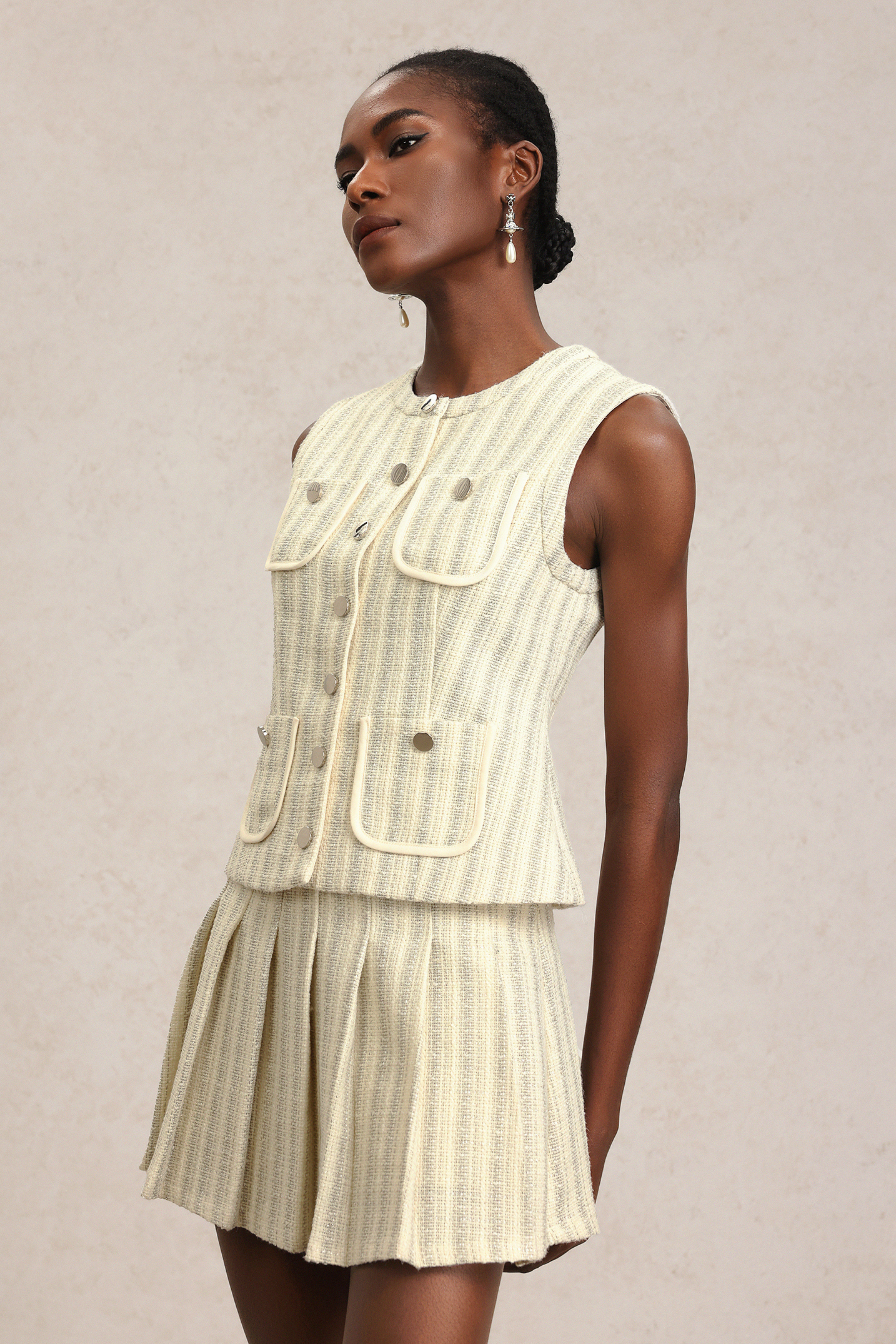 Vikare Sleeveless Round Neck Top And Skirt Two-Piece Set