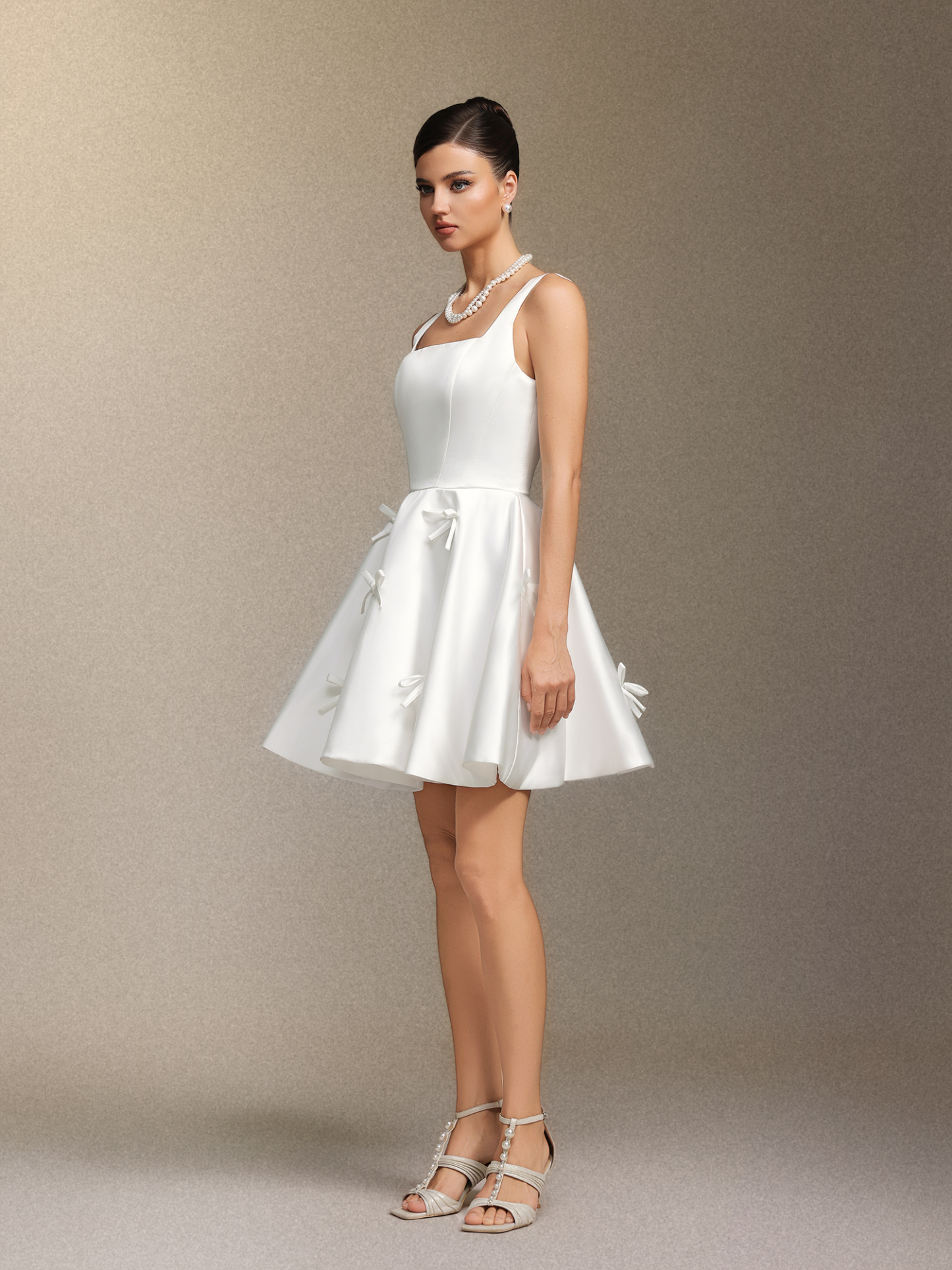 Sequoya Square-neck halter bow mini dress