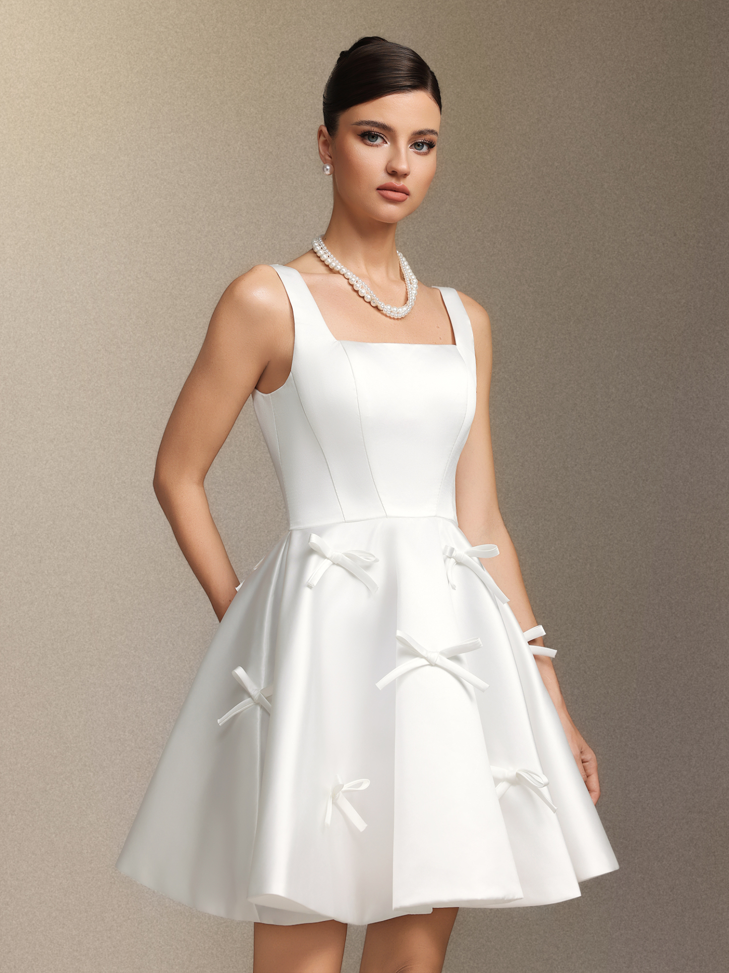 Sequoya Square-neck halter bow mini dress