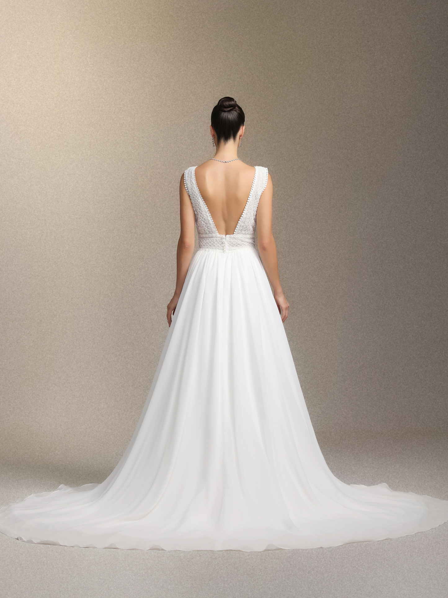 Yalyka Deep V-neck sleeveless high-waisted wedding maxi dress