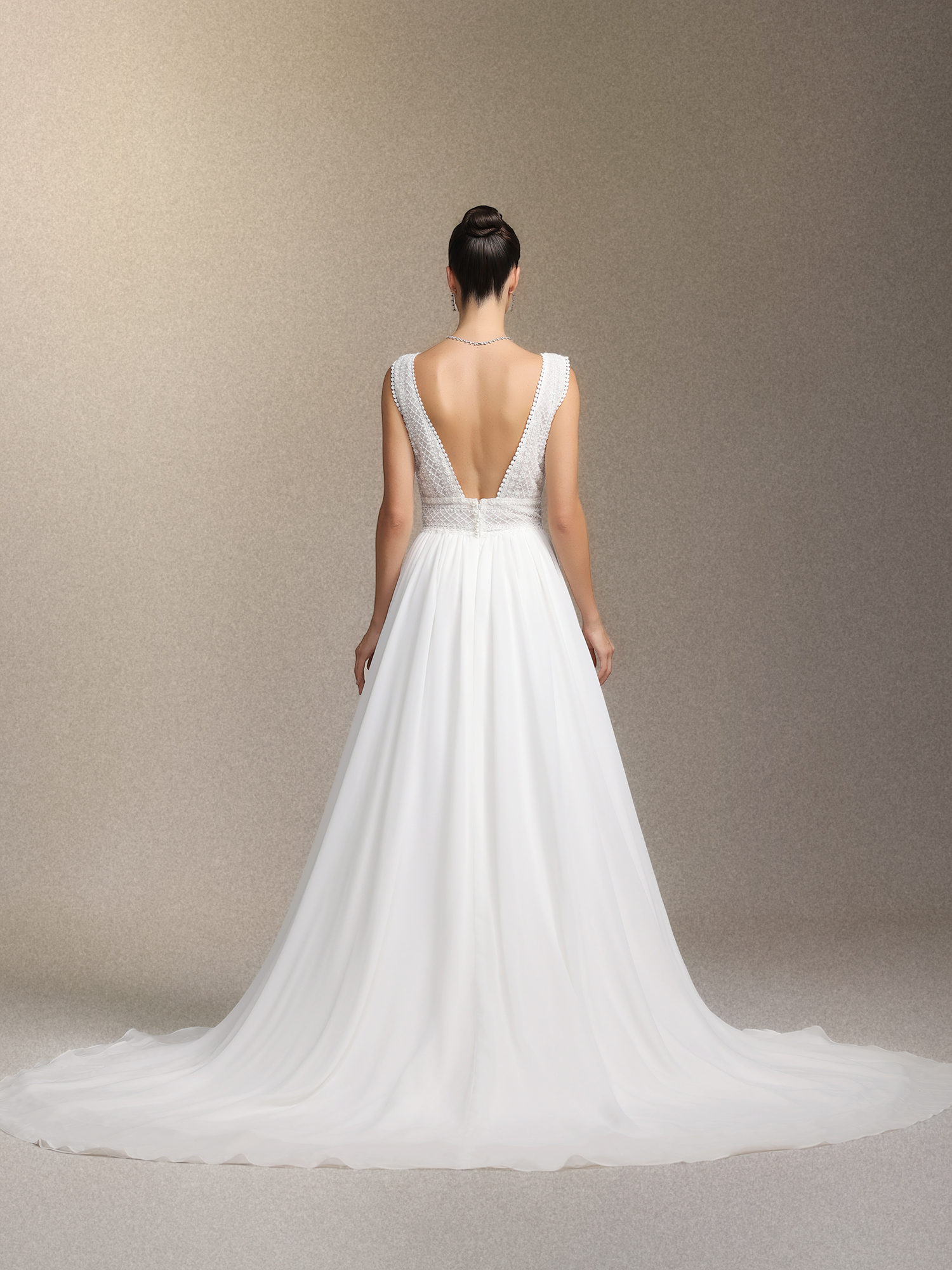 Yalyka Deep V-neck sleeveless high-waisted wedding maxi dress