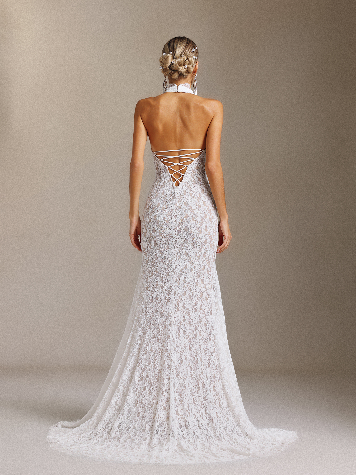 Sloan Lace Halter-neck A trailing skirt hem wedding dress