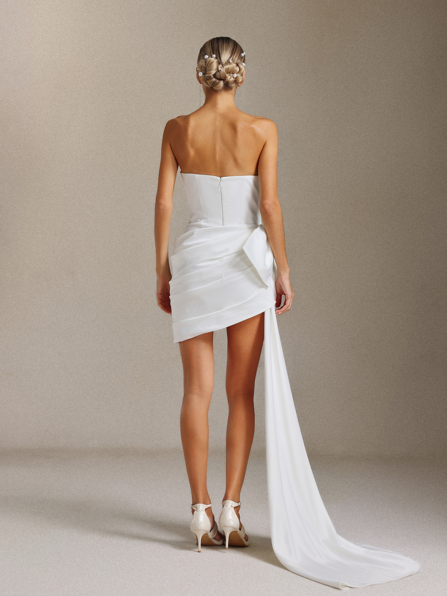 Iransa Pleated bow strapless mini wedding dress