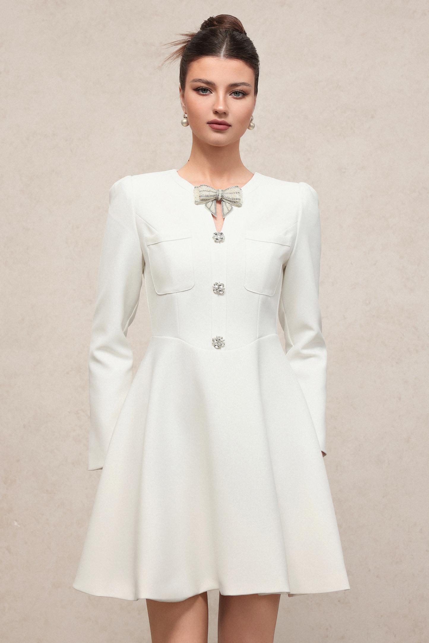 Gacia Elegant Contour Long Sleeve Rhinestone Bow Knit Mini Dress