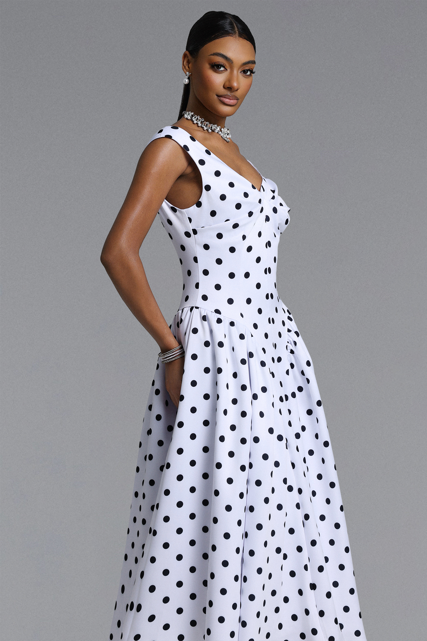 Raidah Classic Tailored Sleeveless Pleated Polka Dot Maxi Dress