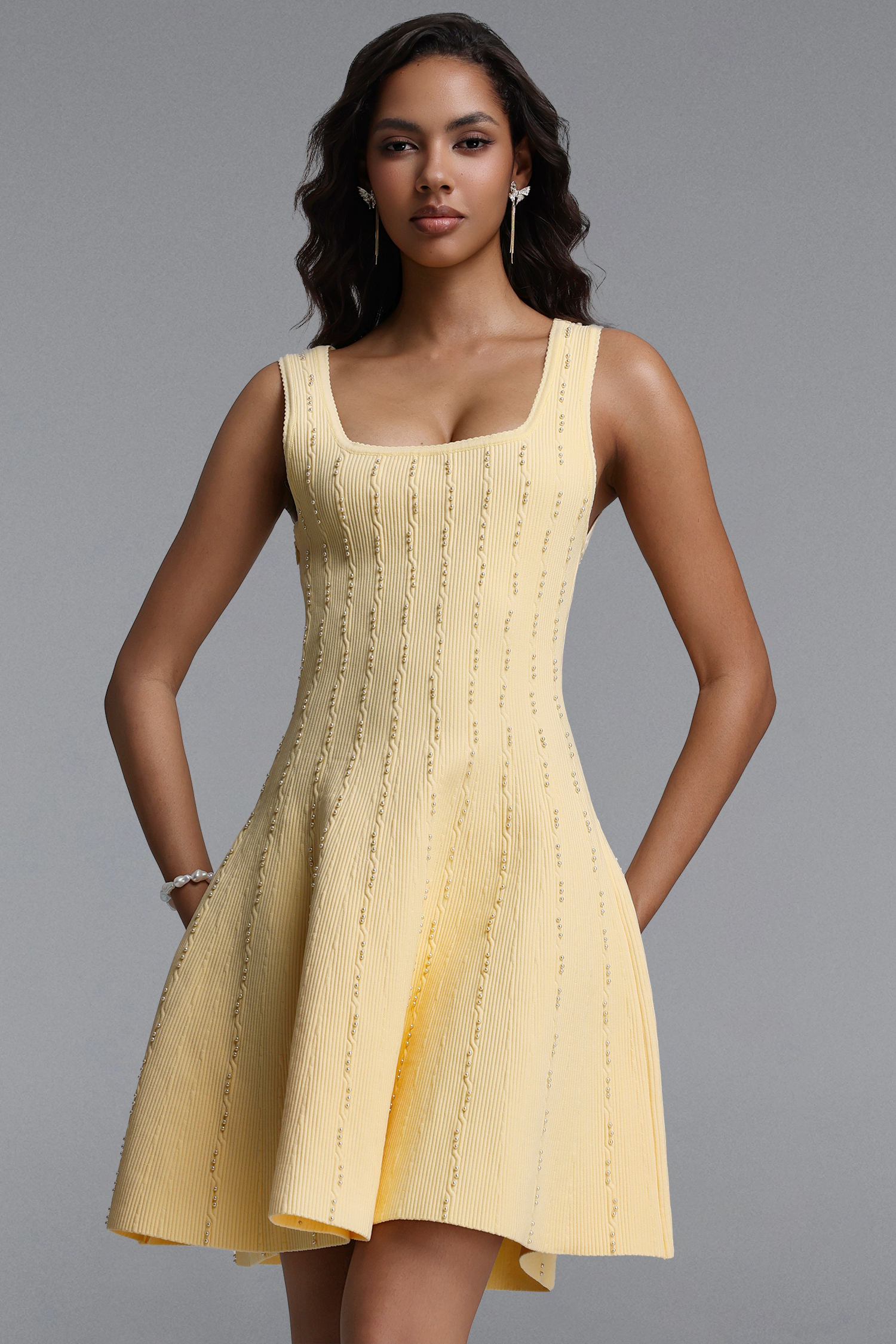 Wenie Classic Cinched Sleeveless Bead Embellished Knit Mini Dress