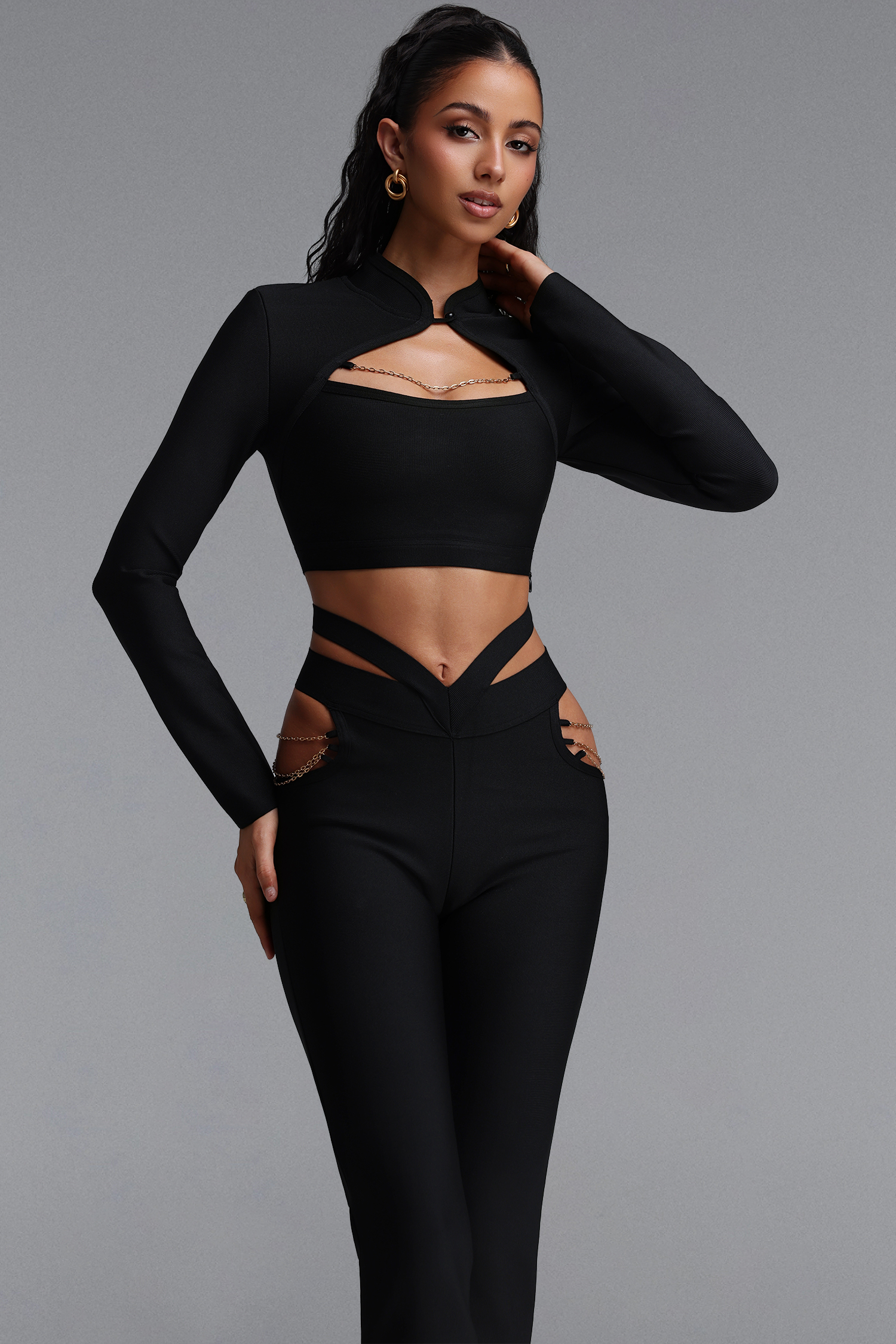 Tanria Chic Contour Long Sleeve Cut Out Top Metal Chain Flare Pant Two Piece Set