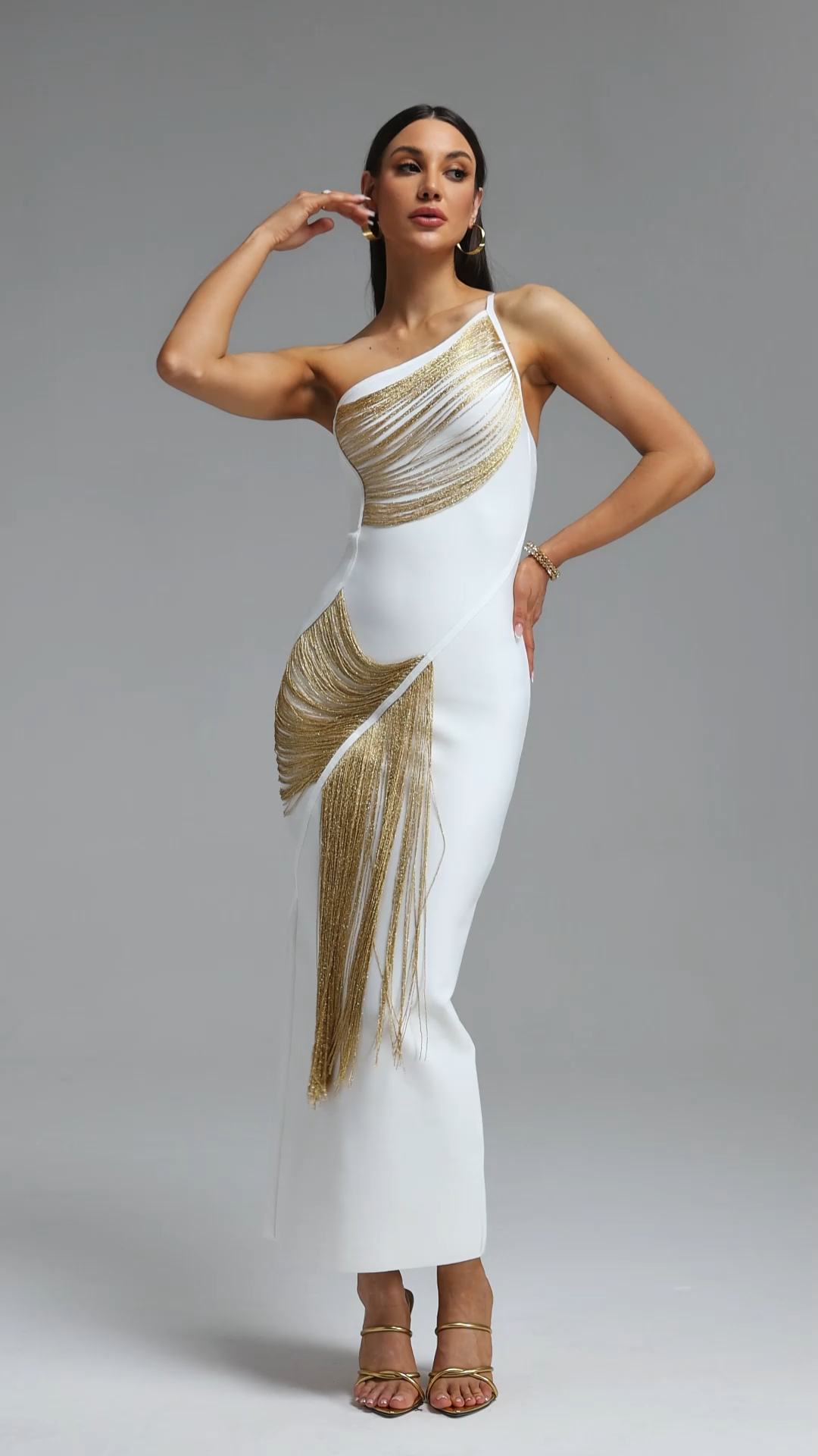 Roanna One Shoulder Sleeveless Golden Tassels Bandage White Maxi Dress