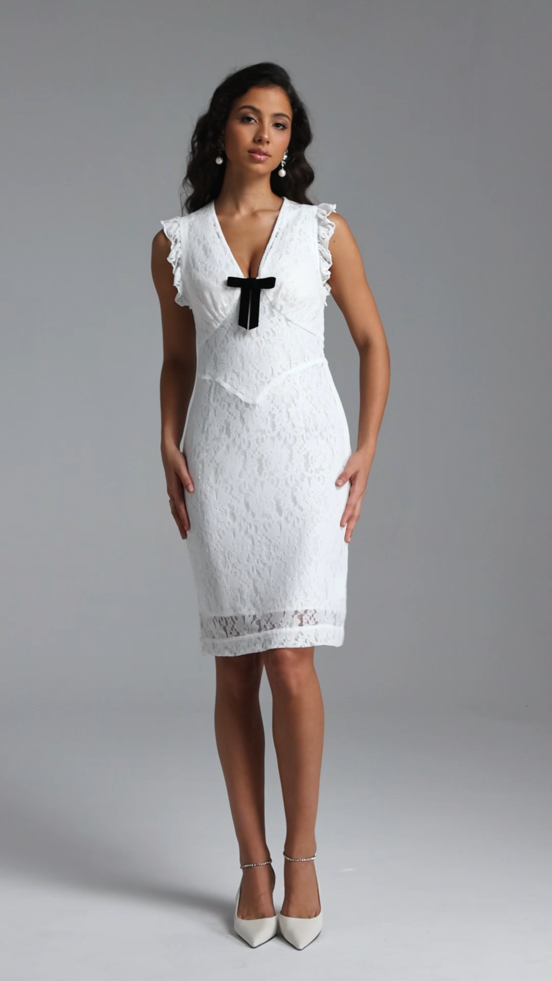 Fagro Elegant Cinched V Neck Sleeveless Bow Ruffle Knit Mini Dress