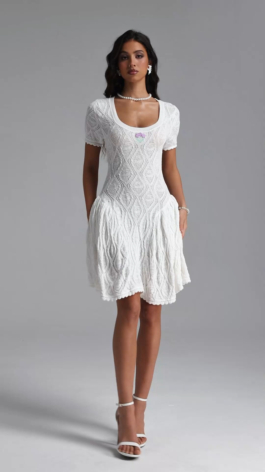 Liama Resort Cinched Short Sleeve Jacquard Knit Mini Dress
