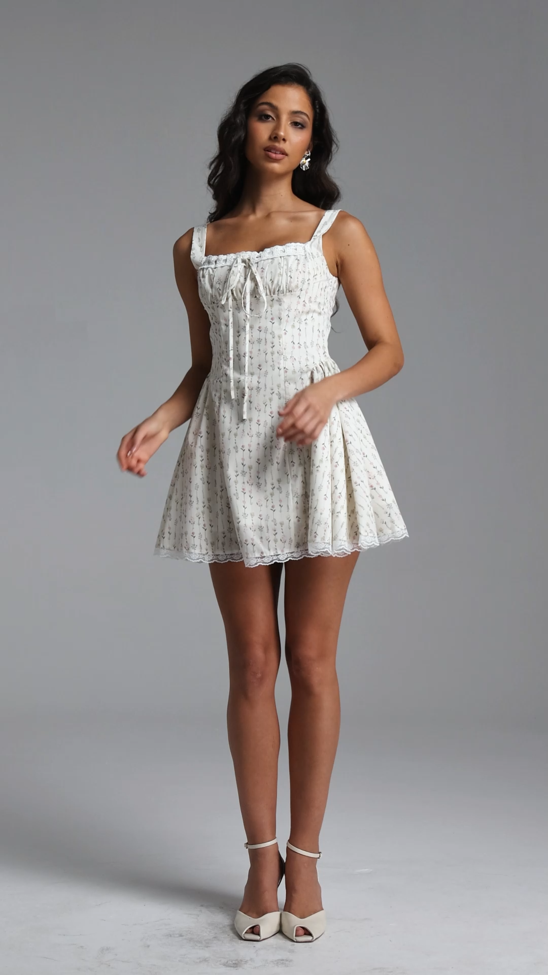 Reyna Romantic Cinched Sleeveless Floral Print Ruched Woven Mini Dress