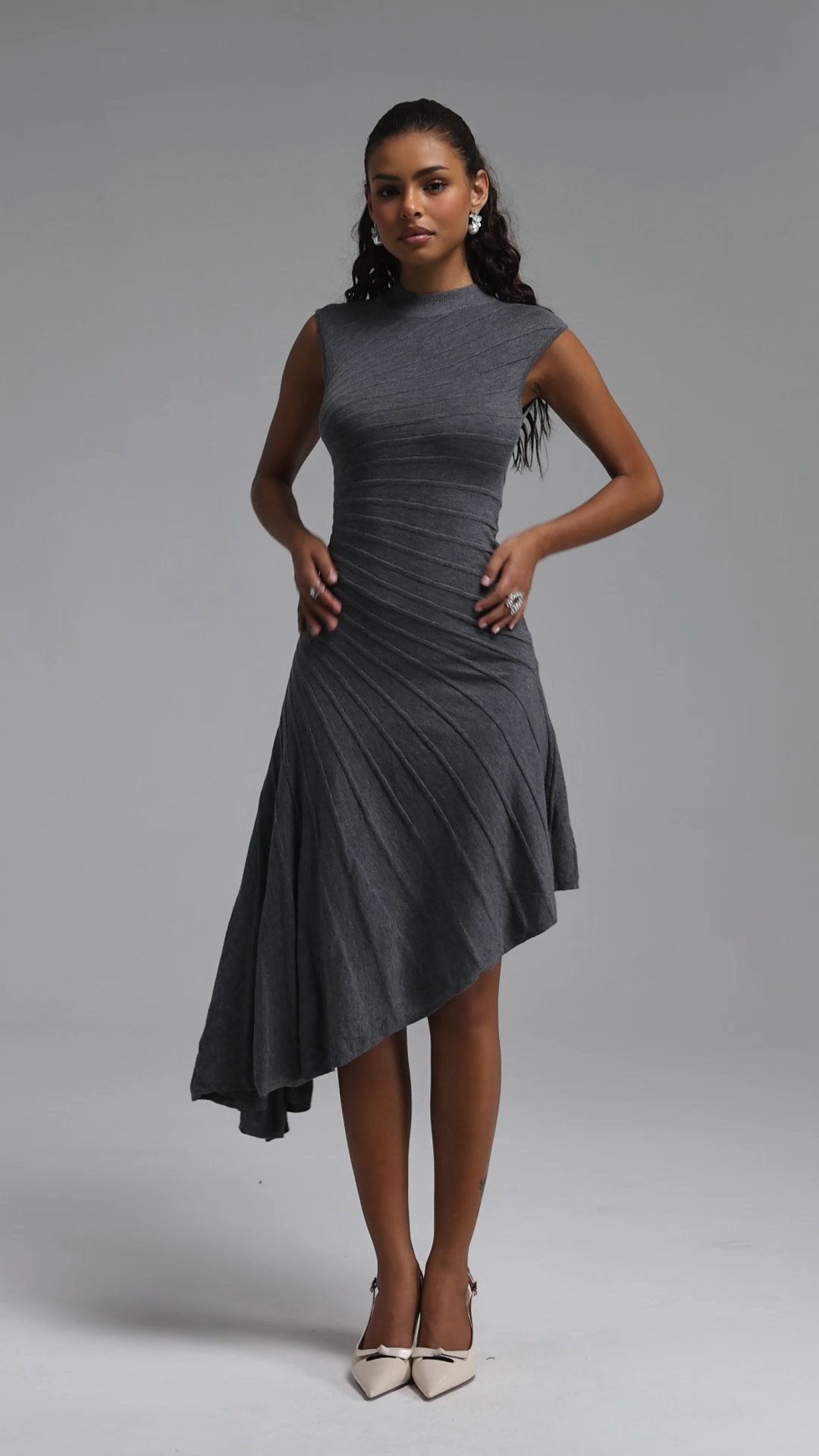 Tadeo Chic Contour Sleeveless Diagonal Stripes Asymmetric Hem Knit Midi Dress