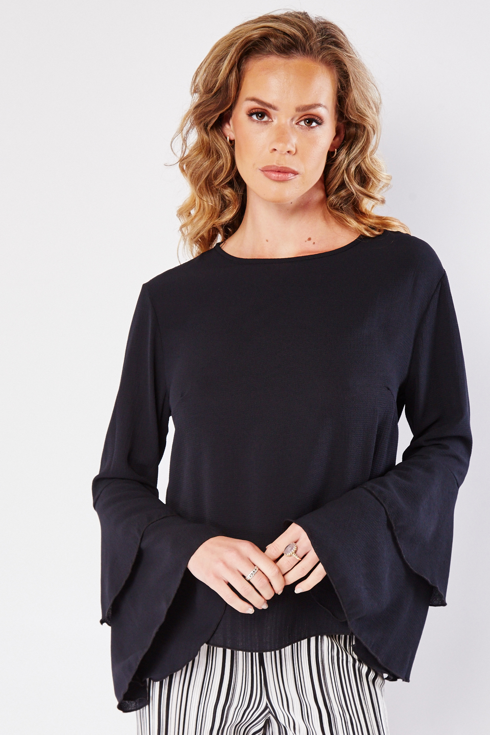 black flared blouse
