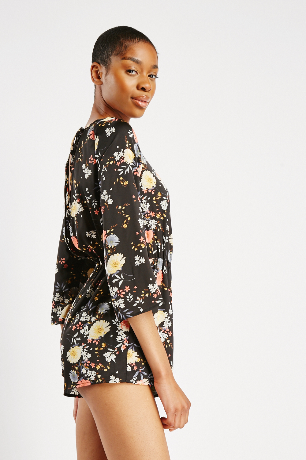 Flared Sleeve Floral Playsuit Everything5Pounds