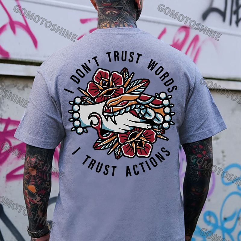 I DON’T TRUST WORLDS, I TRUST ACTIONS Hands Grabing Flowers Black Print T-shirt