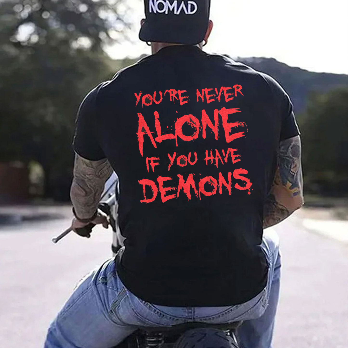 YOU'RE NEVER ALONE IF YOU HAVE DEMONS Black Print T-shirt Image - 1