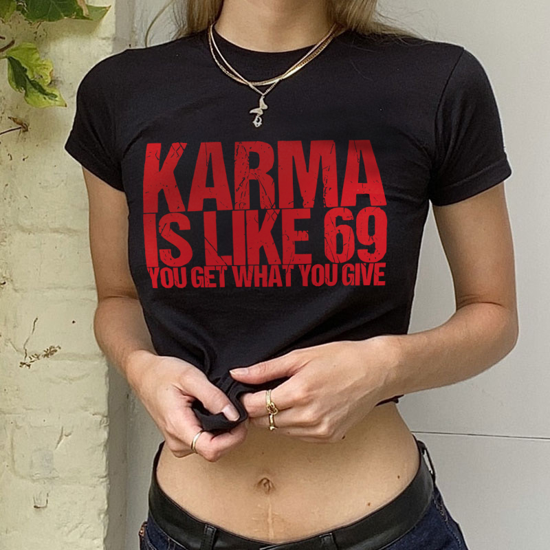 KARMA IS LIKE 69 YOU GET WHAT YOU GIVE Women's Cropped T-shirt