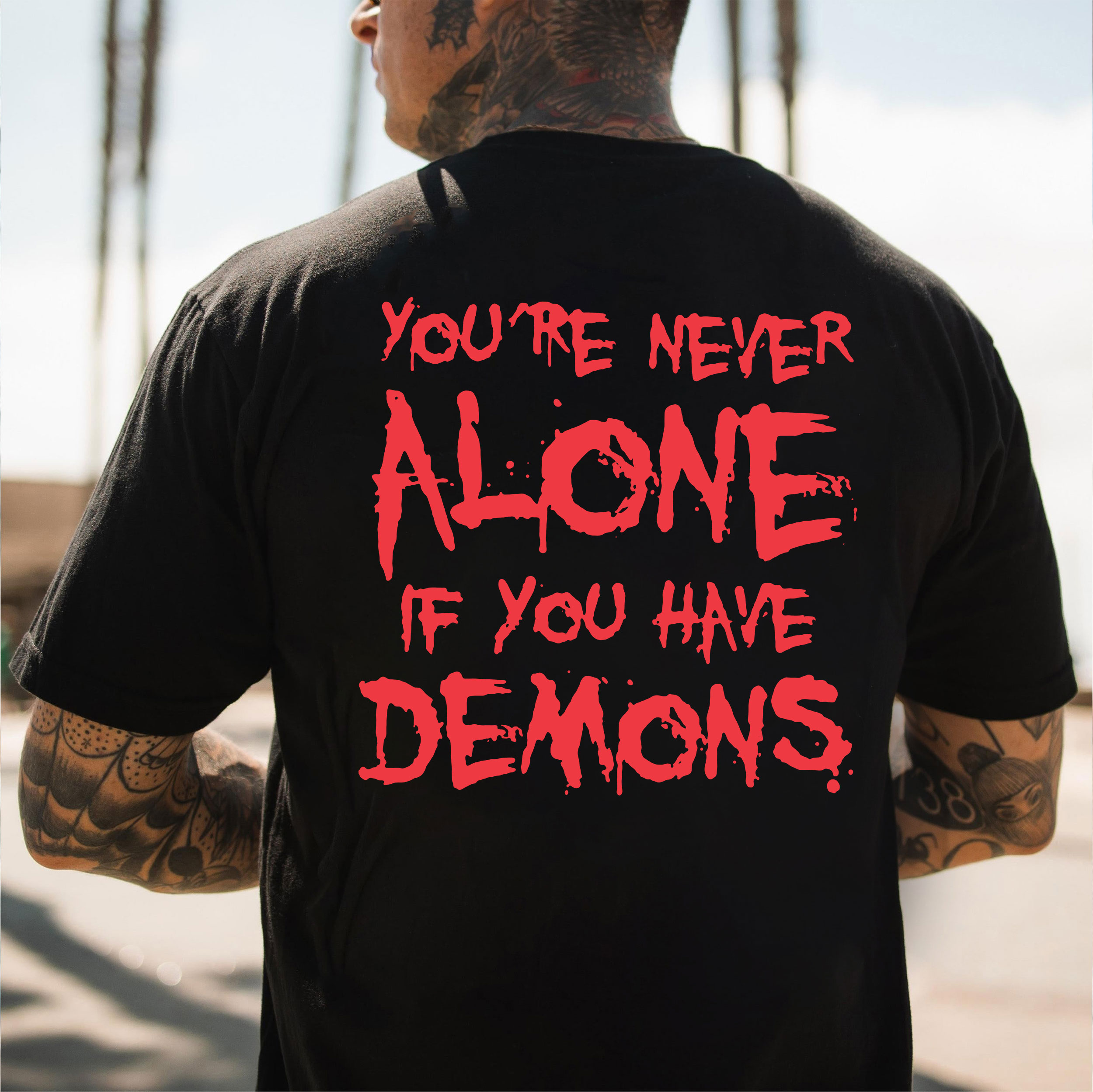 YOU'RE NEVER ALONE IF YOU HAVE DEMONS Black Print T-shirt