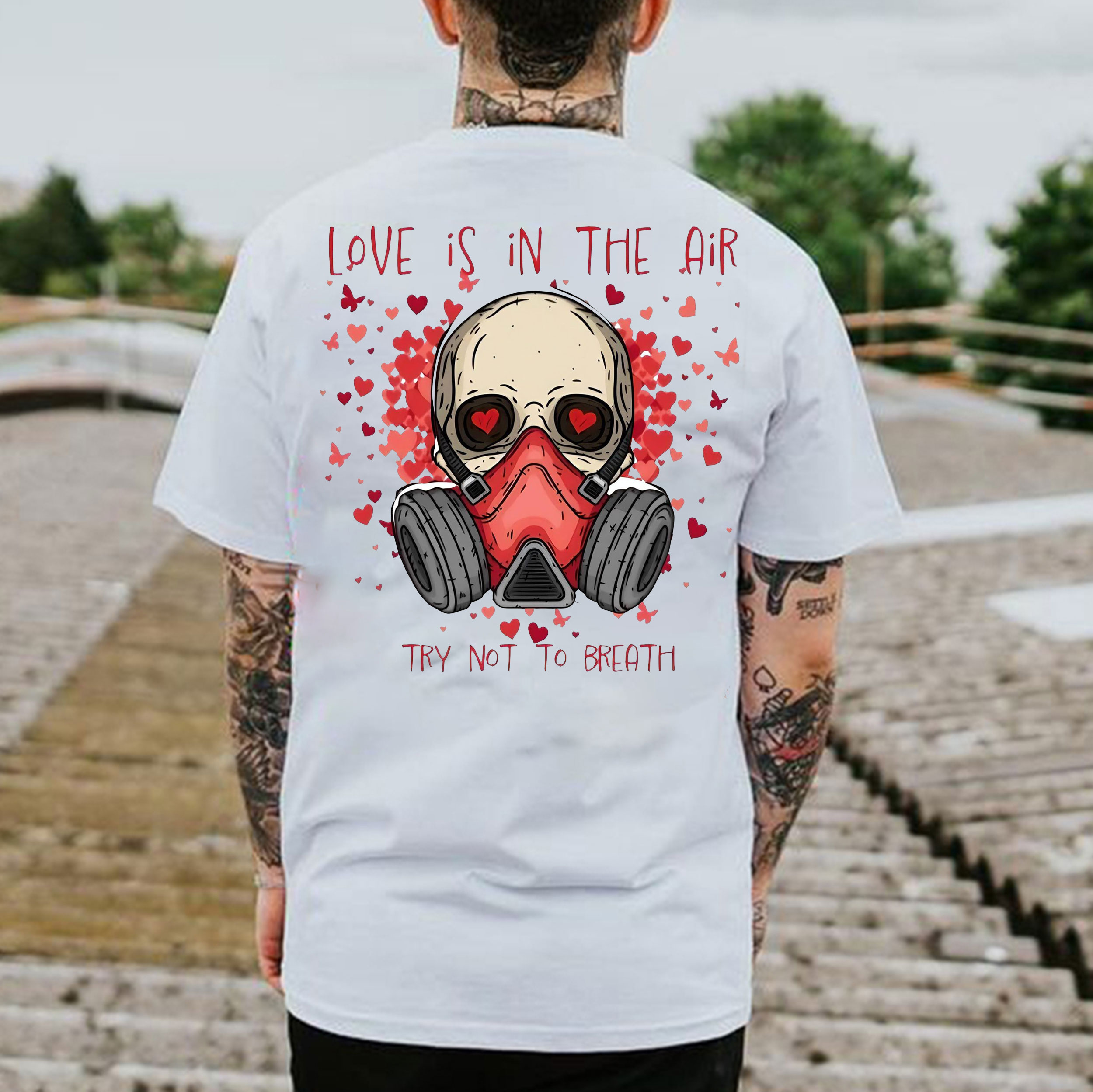LOVE IS IN THE AIR TRY NOT TO BREATH Skull White Print T-Shirt