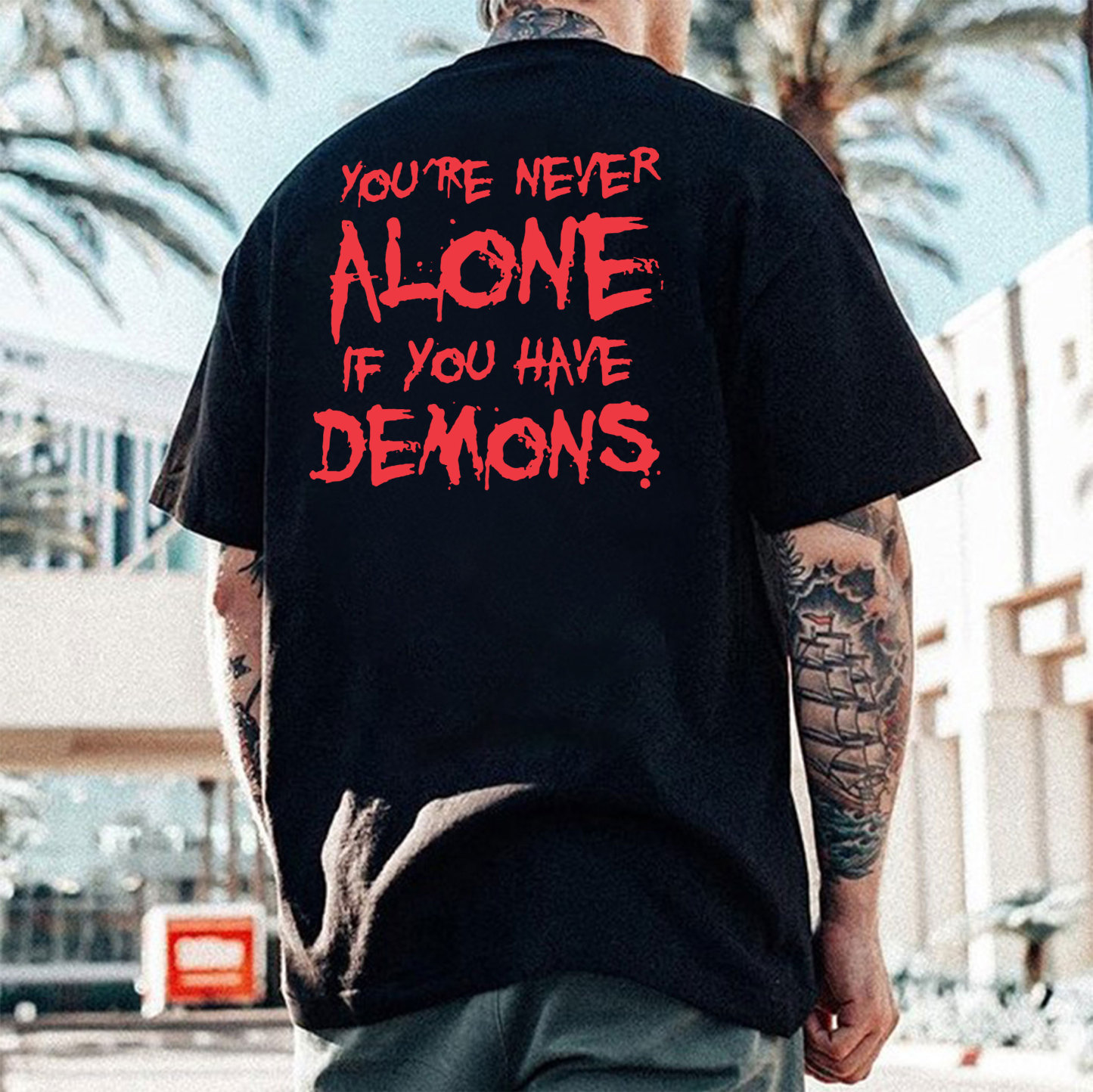 YOU'RE NEVER ALONE IF YOU HAVE DEMONS Black Print T-shirt