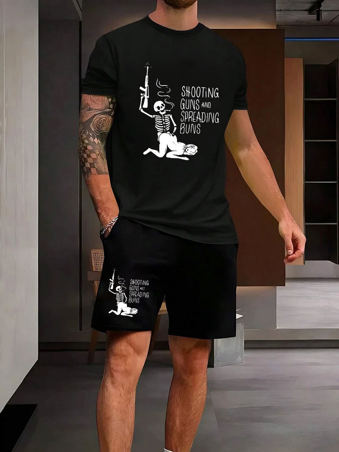 SHOOTING GUNS AND SPREADING BUNS Black Printed Suit