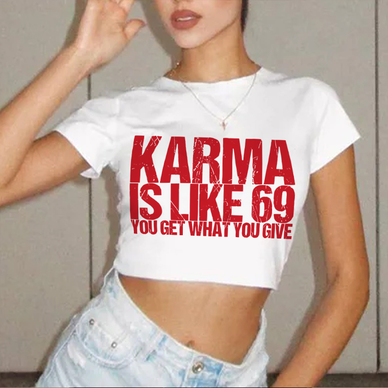 KARMA IS LIKE 69 YOU GET WHAT YOU GIVE Women's Cropped T-shirt
