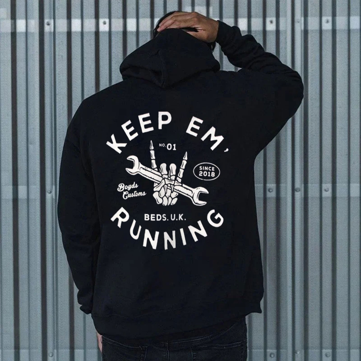 KEEP EM RUNNING Bone Hand Carrying Motor Handles Black Print Hoodie
