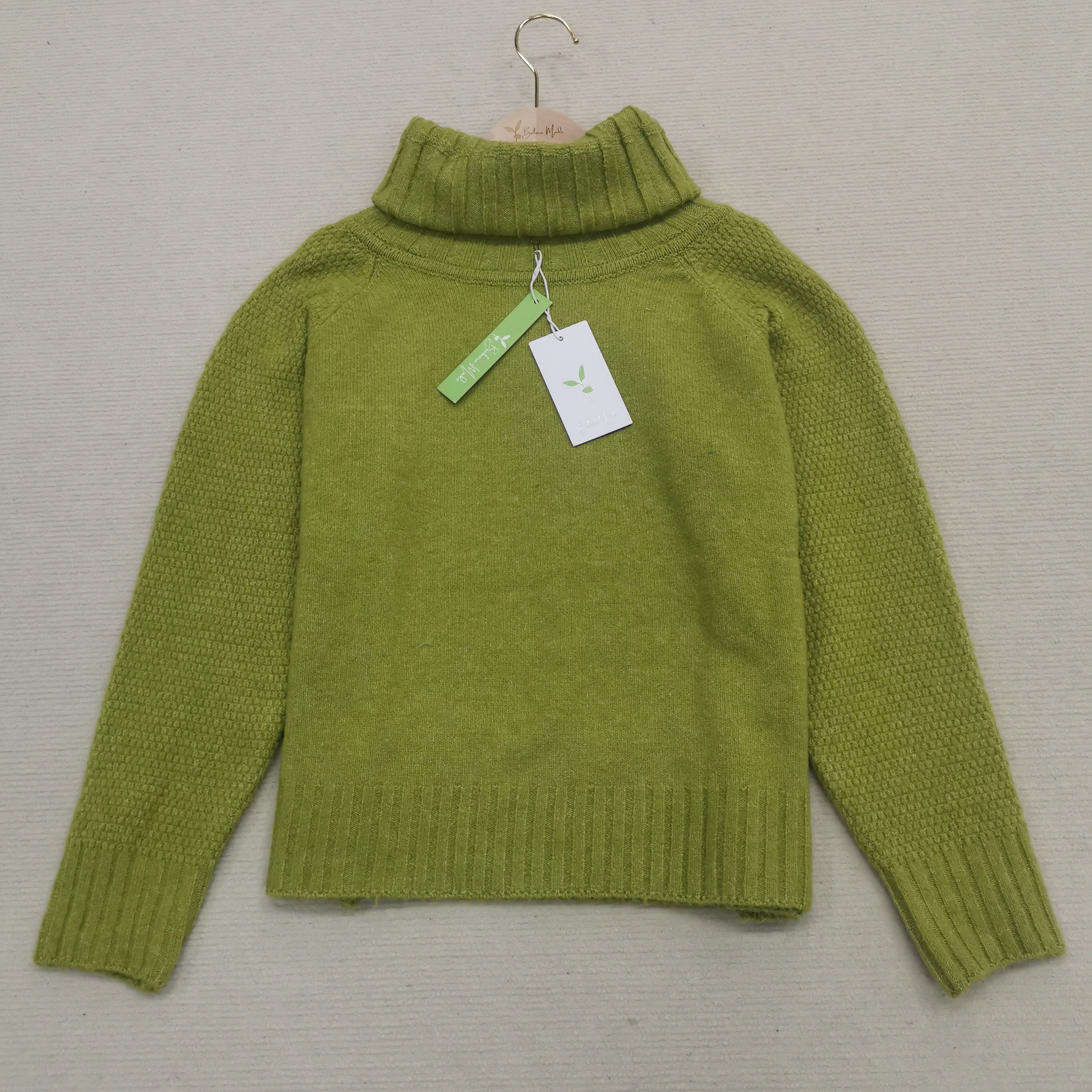 Grasgrüner übergroßer Rollkragenpullover aus Strick