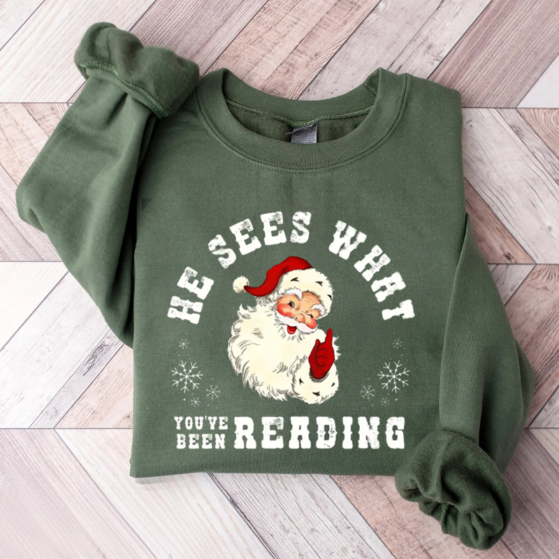 He Sees What You've Been Reading Santa Sweatshirt