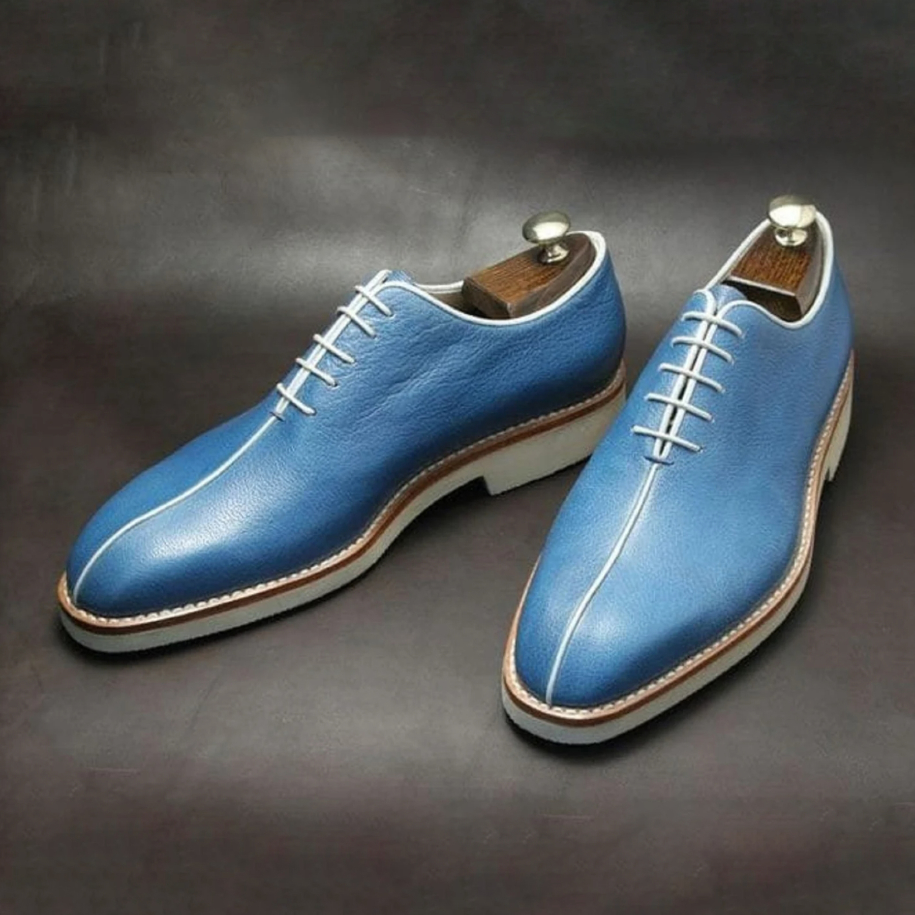 Right side of blue oxford shoes showing clean silhouette and texture-Colinshoes