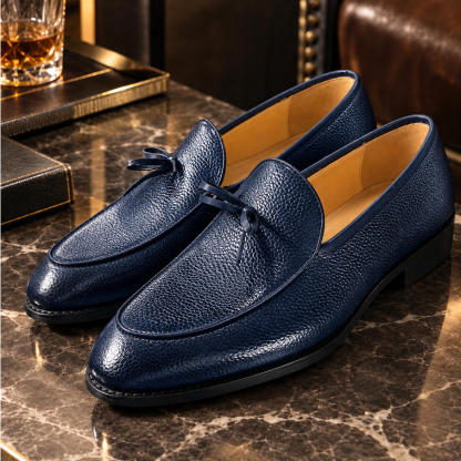 Signature Bow Pebble-Grain Leather Slip-Ons