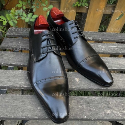Main view of black leather cap toe derby shoes with engraved floral sole design-Colinshoes