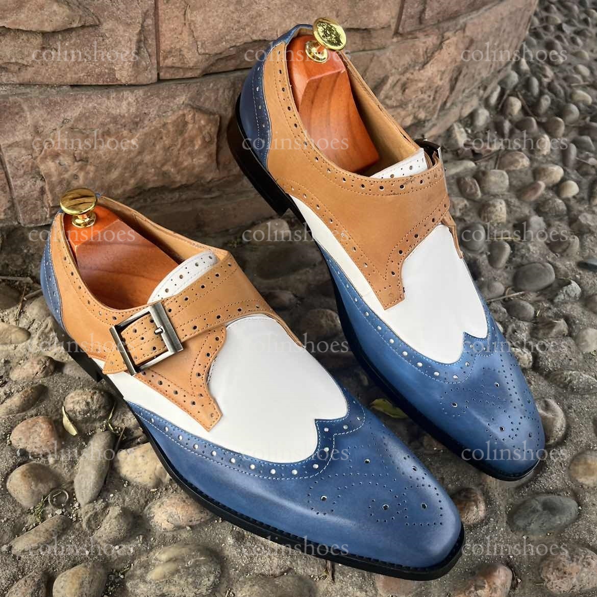 Left angle showing cream, blue, and caramel wingtip brogue details-Colinshoes