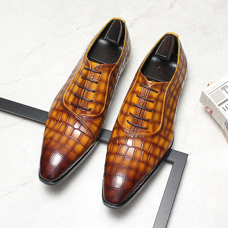 Croc-embossed leather oxford in brown with hand-polished patina finish.