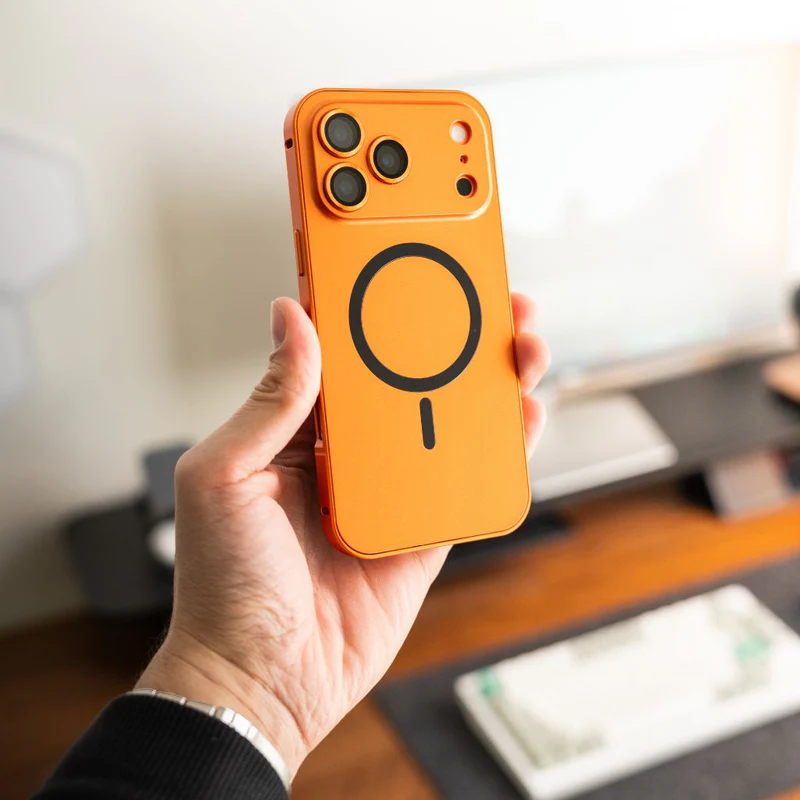 Same color. Same finish. Same perfection. MagSafe Metal completes your iPhone 17 Pro — real aluminum, flawless fit, and a cosmic orange glow to match.