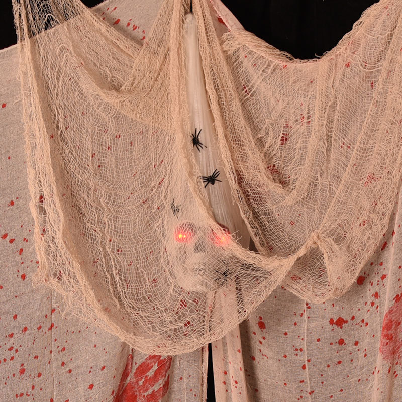 LED Skull in Spider Cocoon Halloween Decoration