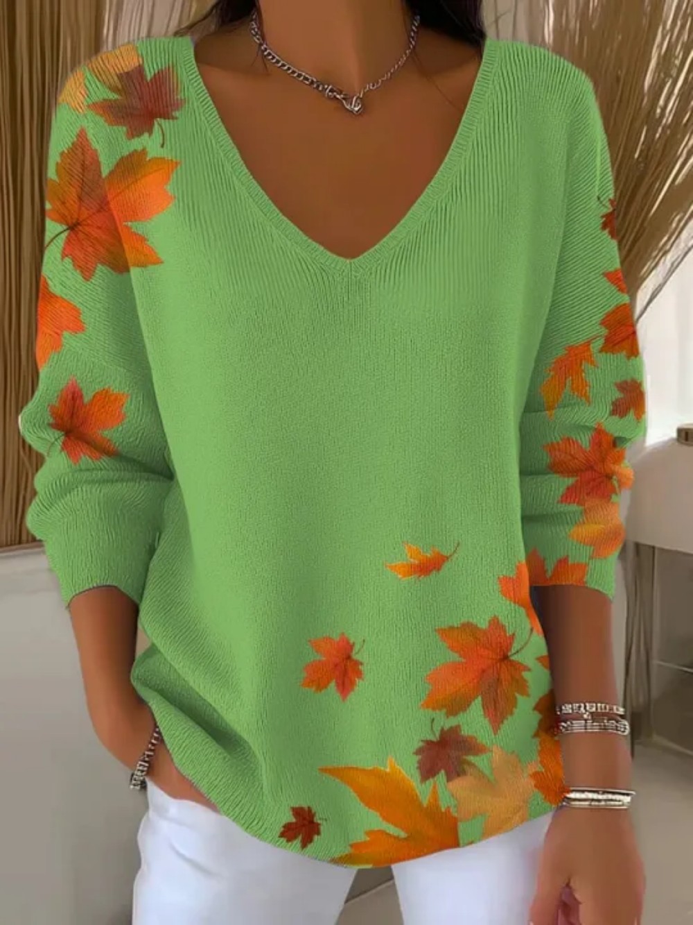 Knitted sweater with long sleeves