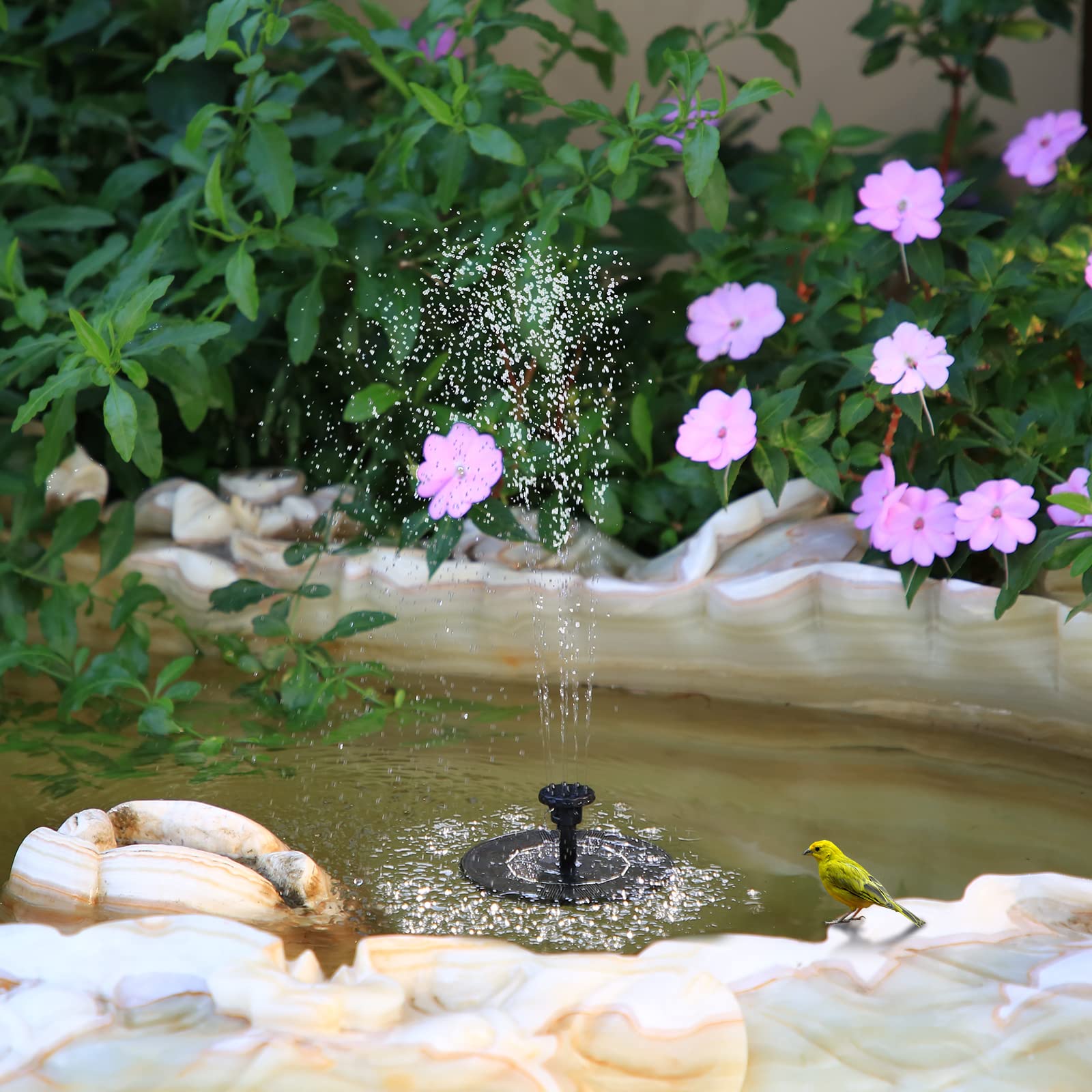 Outdoor solar-powered fountain, suitable for gardens, ponds, bird baths, and DIY water features. Solar-powered floating fountain pump.