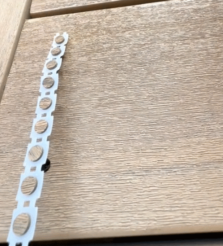 Repairing holes in wooden boards