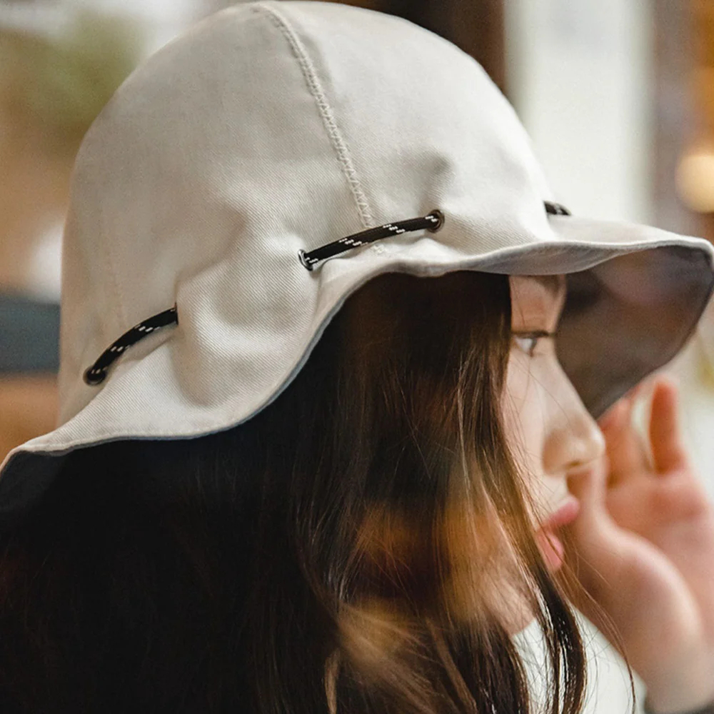 馬登女裝 米白色灰藍色兩用漁夫帽便攜手提零錢包錢袋遮陽帽子男女