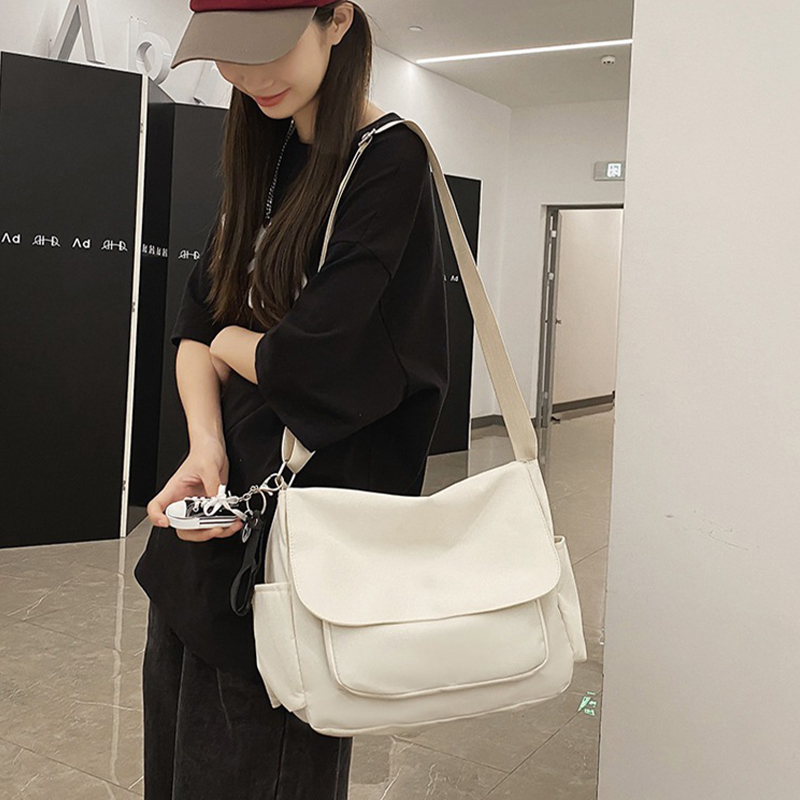 潮牌工裝風斜挎包休閒ins郵差包男女大容量學生單肩包情侶背包