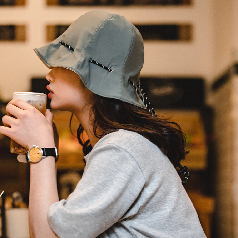 馬登女裝 米白色灰藍色兩用漁夫帽便攜手提零錢包錢袋遮陽帽子男女
