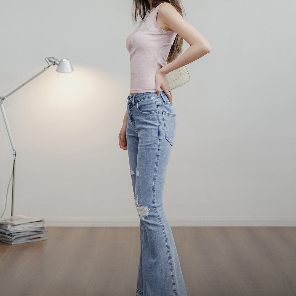 馬登女裝 破洞淺色牛仔褲修身微喇叭褲顯瘦馬蹄褲毛邊長褲