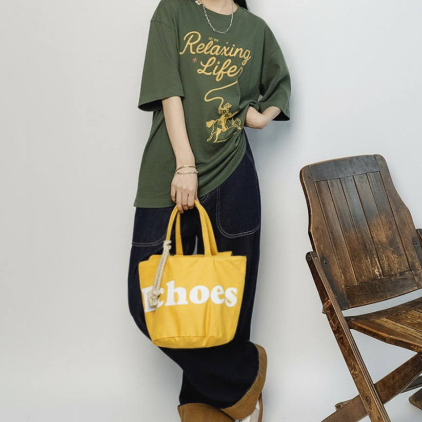 馬登女裝 復古時尚手拎單肩黃色帆布水桶包斜挎包單間手提包包女