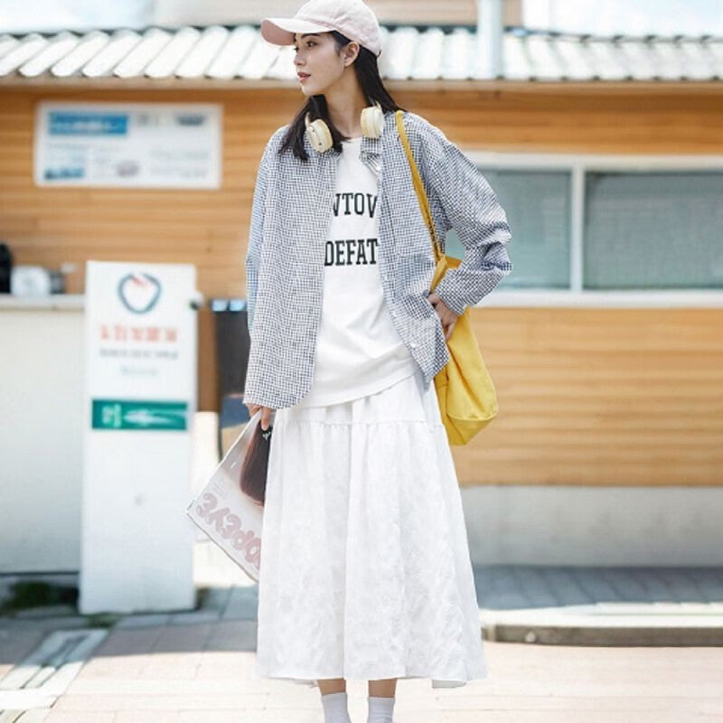 馬登女裝 法式初戀半身裙高腰A字溫柔白色長裙設計感小眾裙