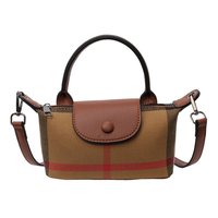 Stílusos csíkos kis válltáska