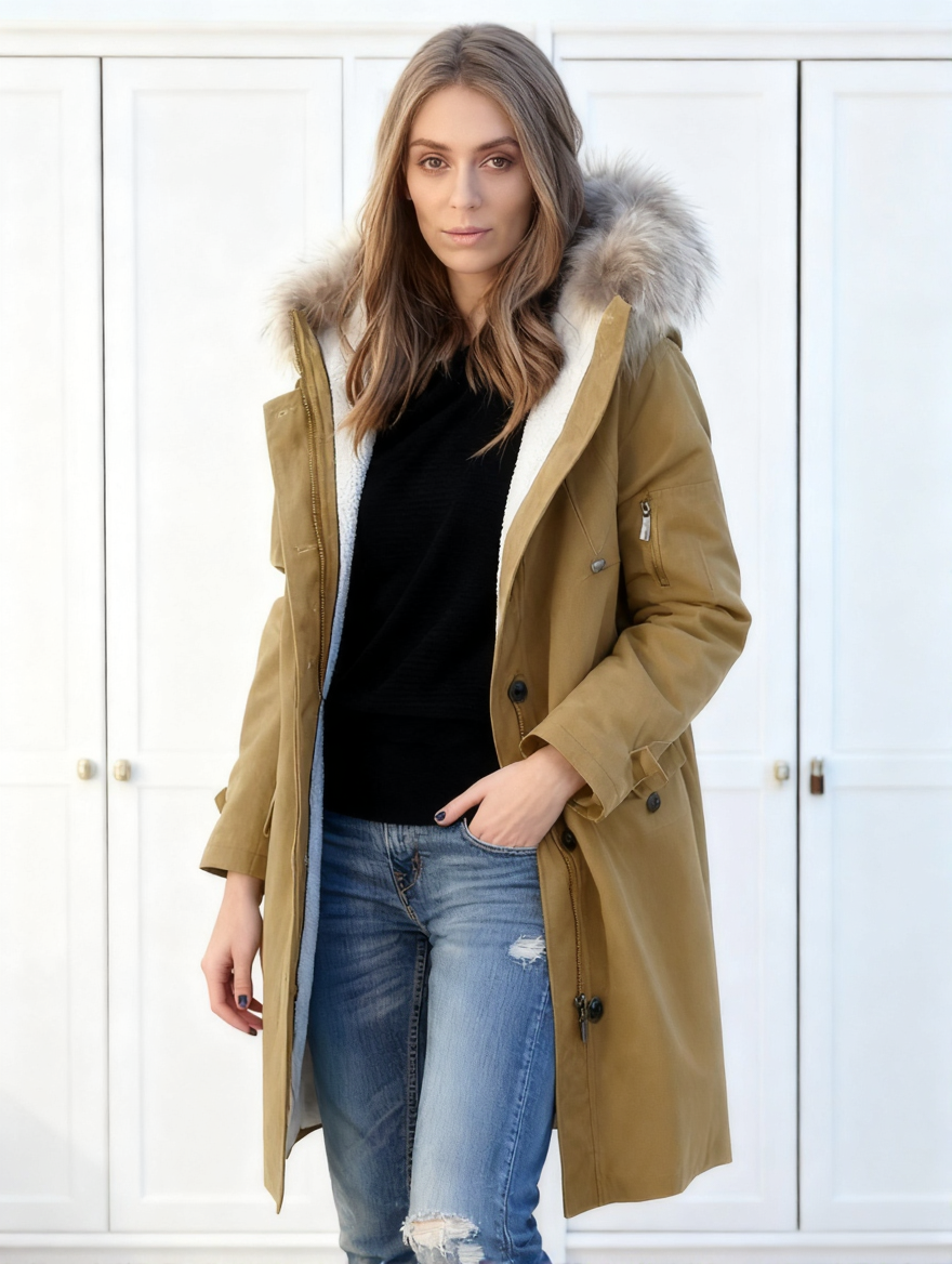 Női hosszú, kapucnis kabát szőrmegallérral